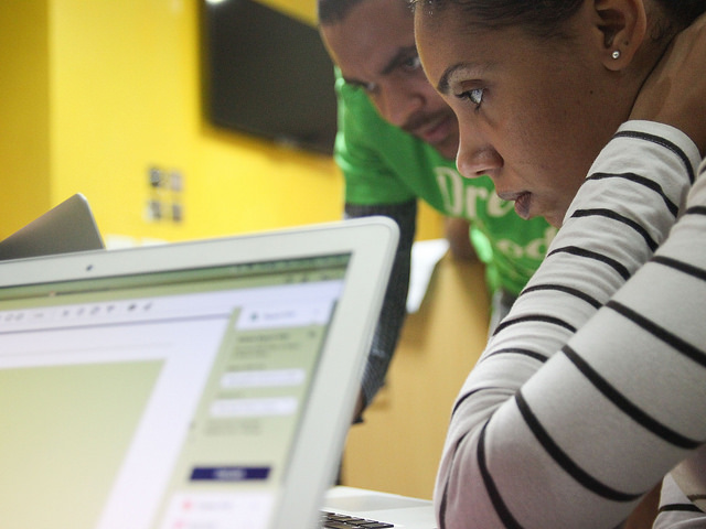 A woman looking at her laptop during Django Girls Lagos 2016.